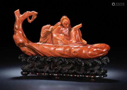 18th/19th century  A VERY RARE AVENTURINE GLASS CARVING OF ZHANG QIAN ON
A RAFT