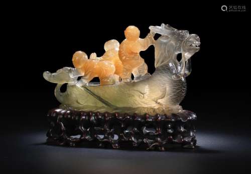 Qing Dynasty   A VERY RARE QUARTZ CARVING OF THE HEHE ERXIAN ON A
'DRAGON' BOAT