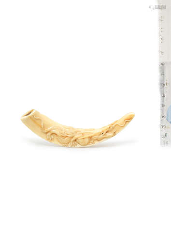 By Kanman (1793-1859), Iwami Province, early 19th century A boar-tusk netsuke of a dragon