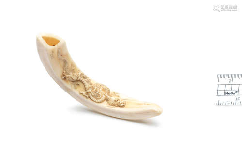 By Bokugyuken Toshiharu (died 1859), Hakata, Chikuzen Province, early to mid-19th century A boar-tusk netsuke of a dragon