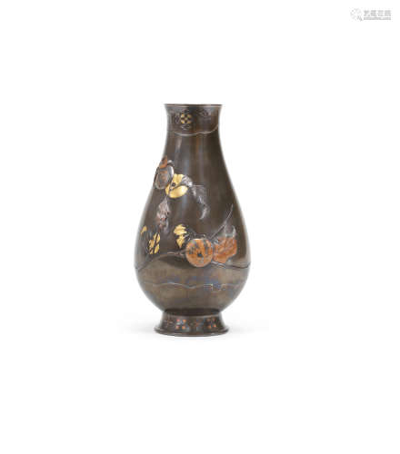 By Suzuki Chokichi (1848-1919), Meiji era (1868-1912), circa 1870s-1880s An inlaid bronze pear-shaped vase