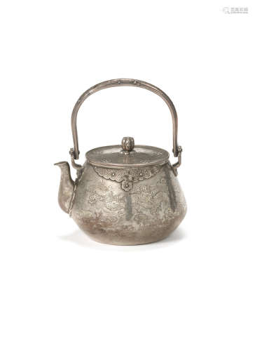 Meiji era (1868-1912), late 19th/early 20th century A silver teapot and cover