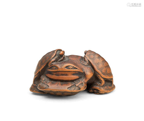 By Hidetsugu, Edo period (1615-1868), 19th century A wood netsuke of terrapins and a frog