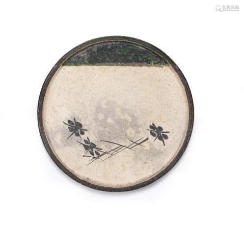 Edo period (1615-1868), late 18th/early 19th century A circular Seto-Oribe stoneware andon zara (lantern oil dish)