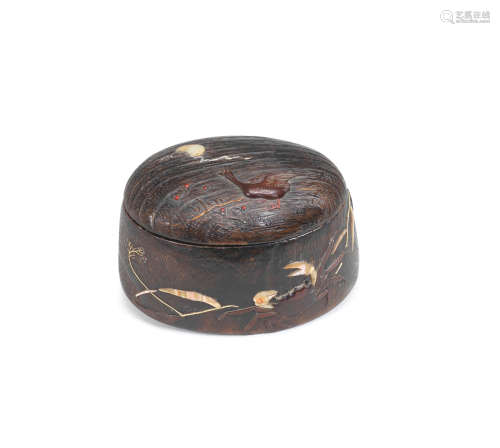 By Isseisai, Edo period (1615-1868), mid/late 19th century  A large inlaid sugi (Japanese cedar) wood oval tonkotsu (tobacco box) and cover