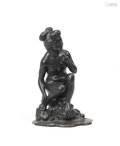 By Takaaki, Meiji era (1868-1912), late 19th/early 20th century A bronze okimono figure of a nude woman