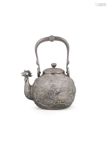 By the Konoike workshop, Meiji era (1868-1912), early 20th century A silver teapot and cover