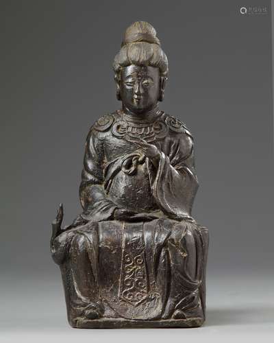 A Chinese bronze figure of a female immortal