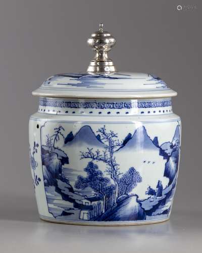 A blue and white pot and cover