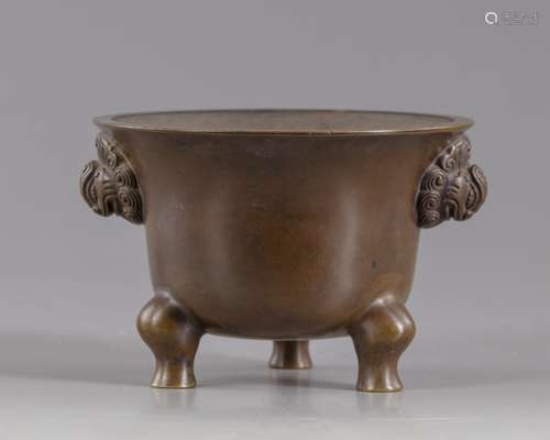 A Chinese bronze tripod censer