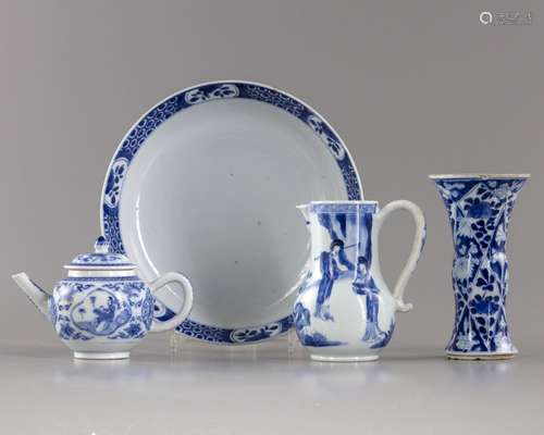 A group of four blue and white objects