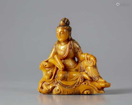 A Chinese soapstone figure of Guanyin