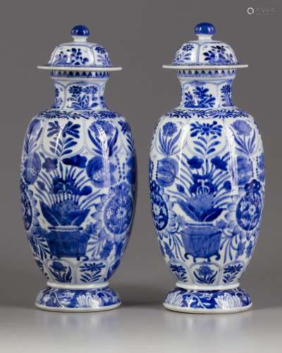 Two blue and white vases with cover