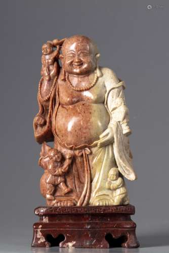 A Chinese soapstone figure of Budai