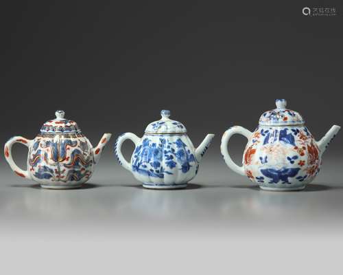 Three Chinese moulded teapots and covers