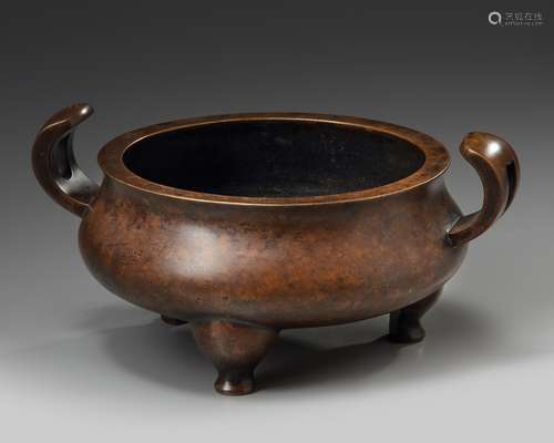 A Chinese bronze tripod censer