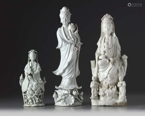 Three Chinese white-glazed figures of Guanyin