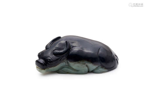 A black and celadon jade carving of a water buffalo