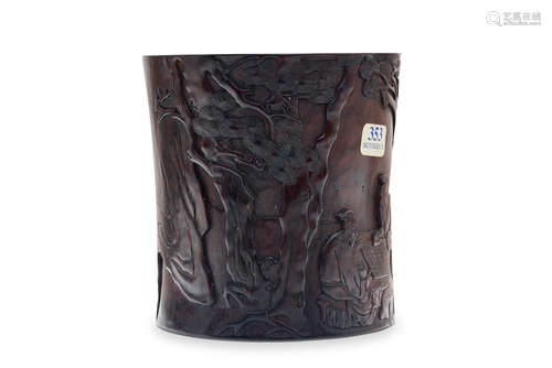 Qing Dynasty A carved hardwood 'chess under the pint tree' brush pot