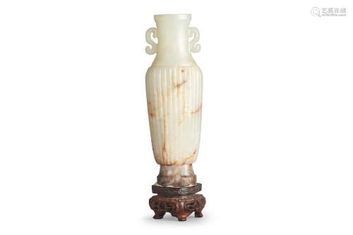 Qing dynasty to Republic Period A carved miniature pale-celadon jade vase
