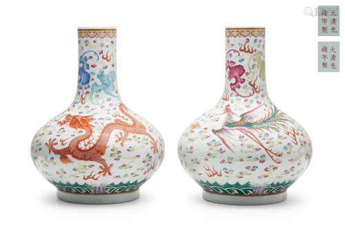 Guangxu mark and of the period A pair of famille-rose 'dragon and phoenix' bottle vases