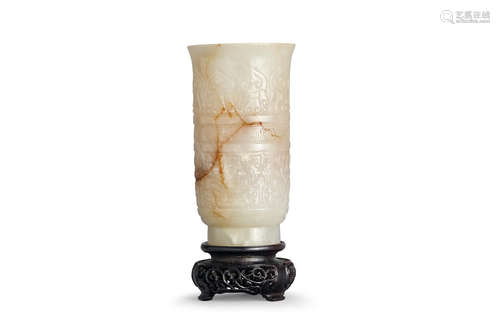 18th/ 19th century A carved white jade beaker vase