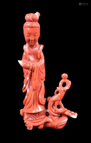 ϒ A Chinese coral carving a lady and bird