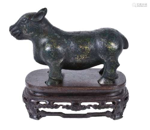 A Chinese gold and silver-inlaid bronze tapir