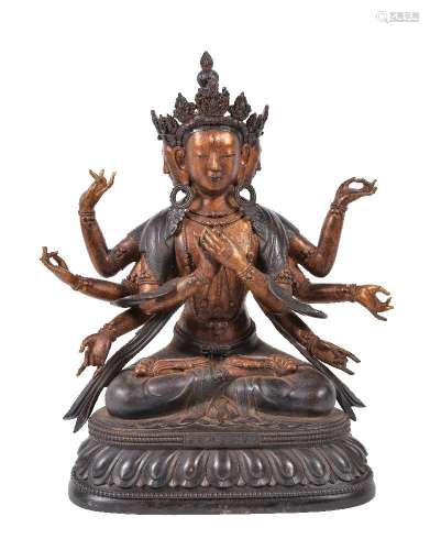 A Sino-Tibetan parcel-gilt bronze figure of Avalokitesvara