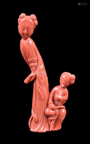 ϒ A Chinese coral figure of a lady and attendant
