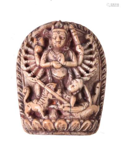 ϒ A small Nepalese ivory relief of Durga slaying the Buffalo Demon