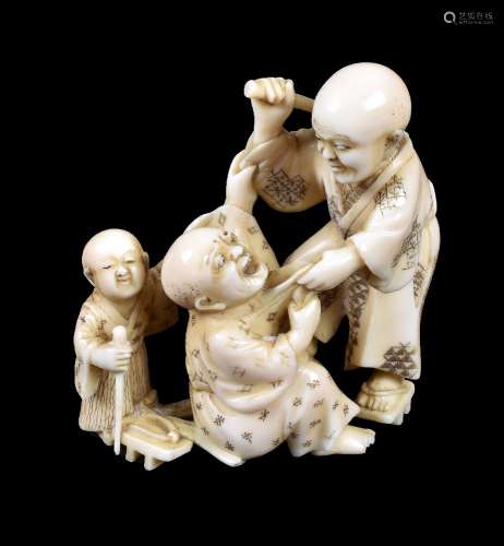 ϒ A Japanese carved Ivory Okimono of two blind men attacking each other