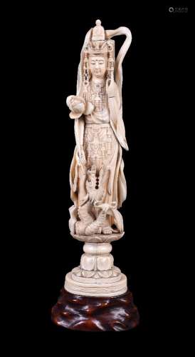 ϒ A Japanese sectional ivory Okimono of Guanyin