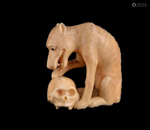 ϒ A Japanese Walrus Ivory Okimono of a Wolf