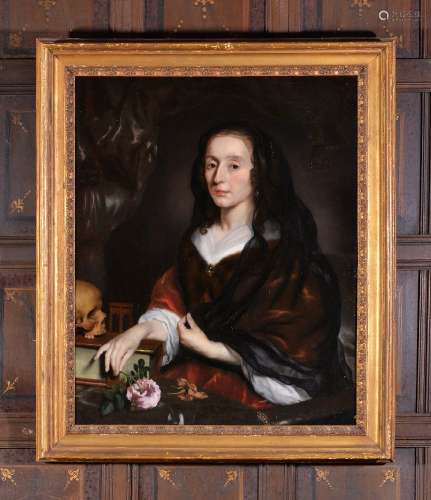 Nicolaes Maes (Dutch 1634 - 1693)Portrait of a lady with a black veil and veritas symbols