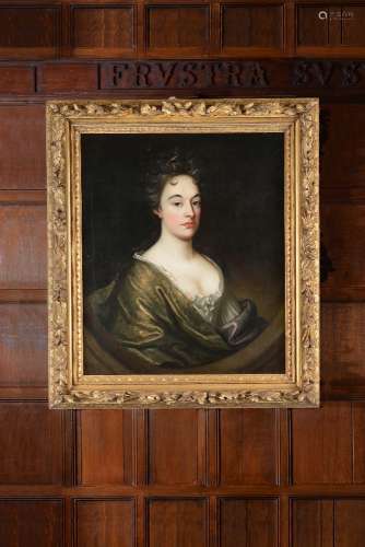 Circle of Sir Godfrey Kneller (British 1646 - 1723) Portrait of a lady with a green cloak