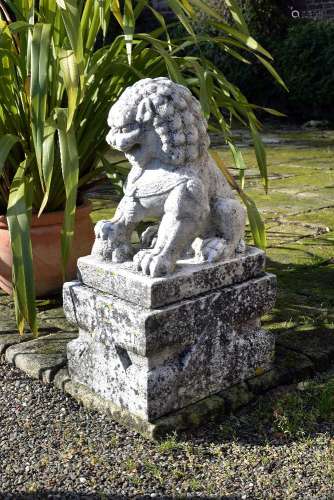 A pair of carved white marble dogs of Fo