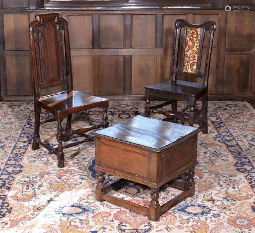 Two similar William III oak hall chairs, circa 1700