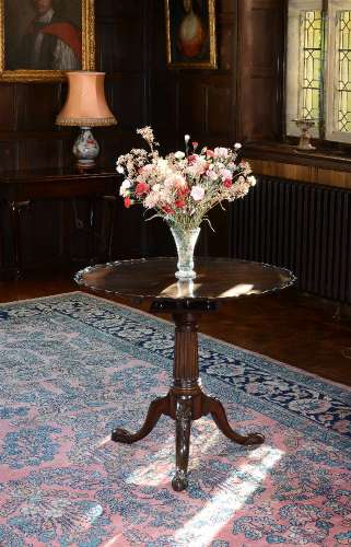 A George III mahogany ‘pie crust’ tripod table