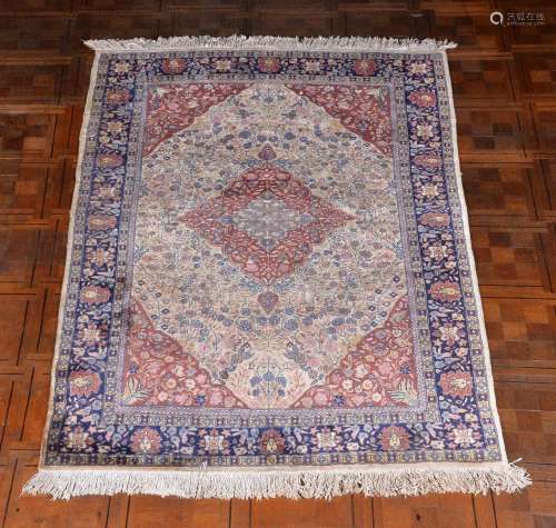 A Tabriz rug