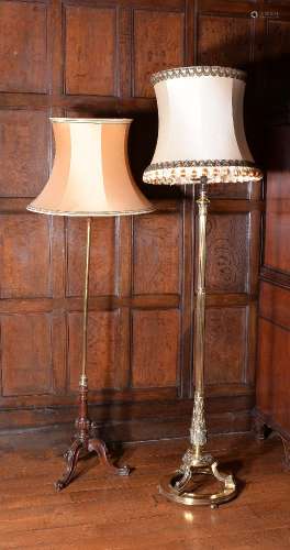 A gilt metal columnar standard lamp in Victorian style
