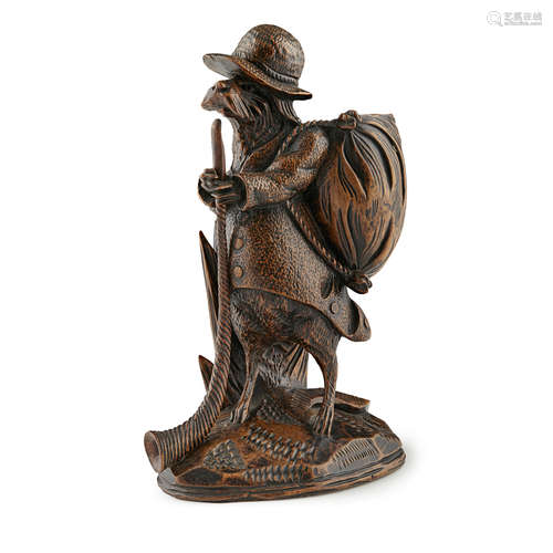 BLACK FOREST NOVELTY LINDEN WOOD TOBACCO OR MATCH HOLDER CIRCA 1860 carved as a dog in Tyrolean