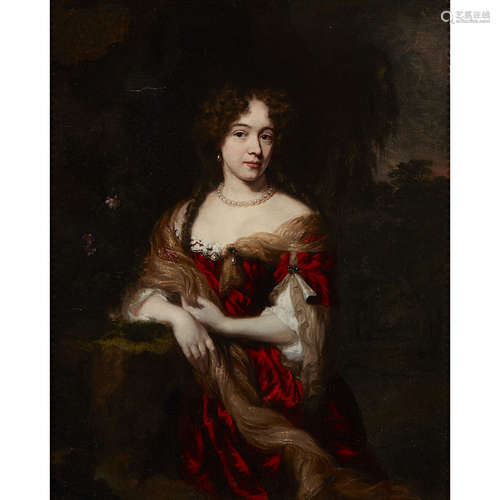 FOLLOWER OF NICOLAES MAES THREE QUARTER LENGTH PORTRAIT OF A LADY IN A RED DRESS Oil on canvas