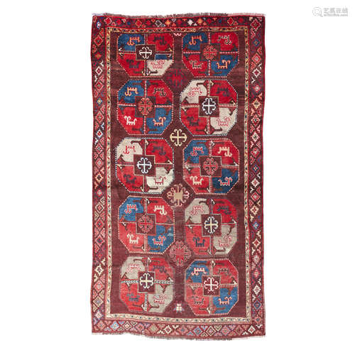 KARAKALPAK CARPET UZBEKISTAN, LATE 19TH/EARLY 20TH CENTURY the brown field with two columns of