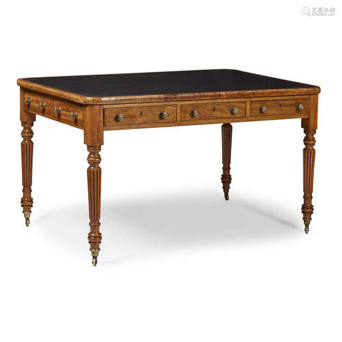 LATE GEORGE III MAHOGANY LIBRARY TABLE EARLY 19TH CENTURY the rounded rectangular top with a black