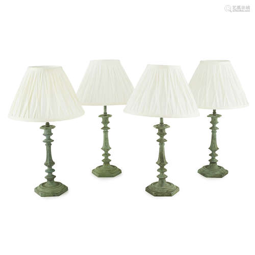 FOUR VERDIGRIS PATINATED BRONZE TABLE LAMPS 19TH CENTURY converted from candlesticks, with