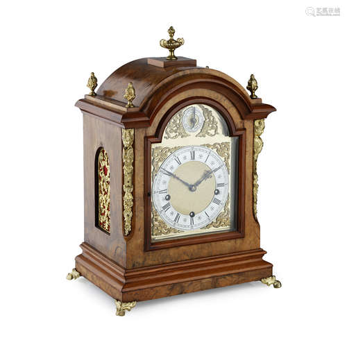 GERMAN WALNUT CHIMING BRACKET CLOCK 20TH CENTURY with gilt metal mounts, the arched top above the