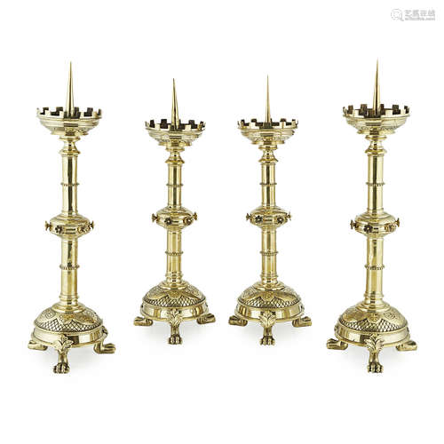 SET OF FOUR FRENCH BRASS PRICKET CANDLESTICKS MID 19TH CENTURY in two sizes, all in the French