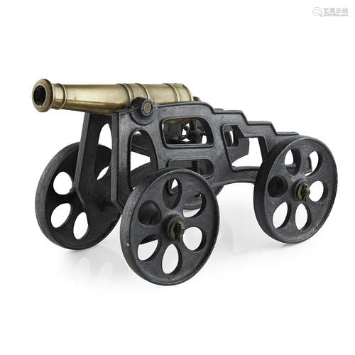 BRONZE AND IRON SIGNAL CANNON 19TH CENTURY the 14 inch, 3cm barrel mounted on a cast-iron four-wheel