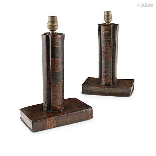 PAIR OF FRENCH NOVELTY TABLE LAMPS CIRCA 1920 the square columns clad in leather book spines,